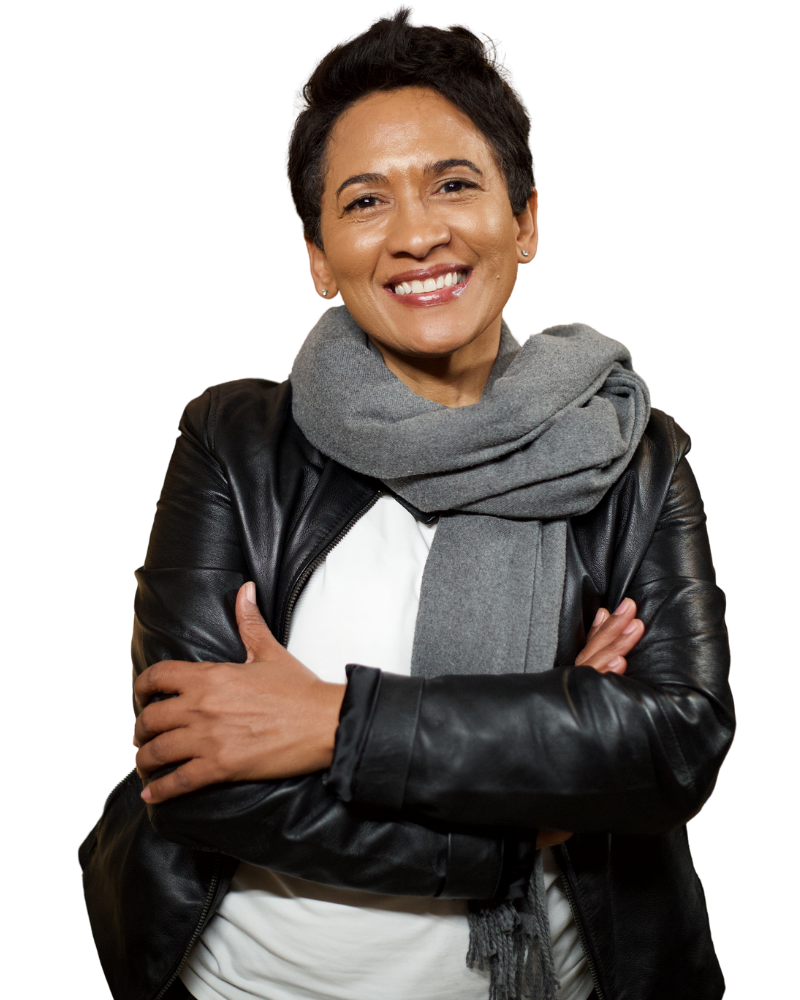 Carmen Stevens in leather jacket and scarf smiles