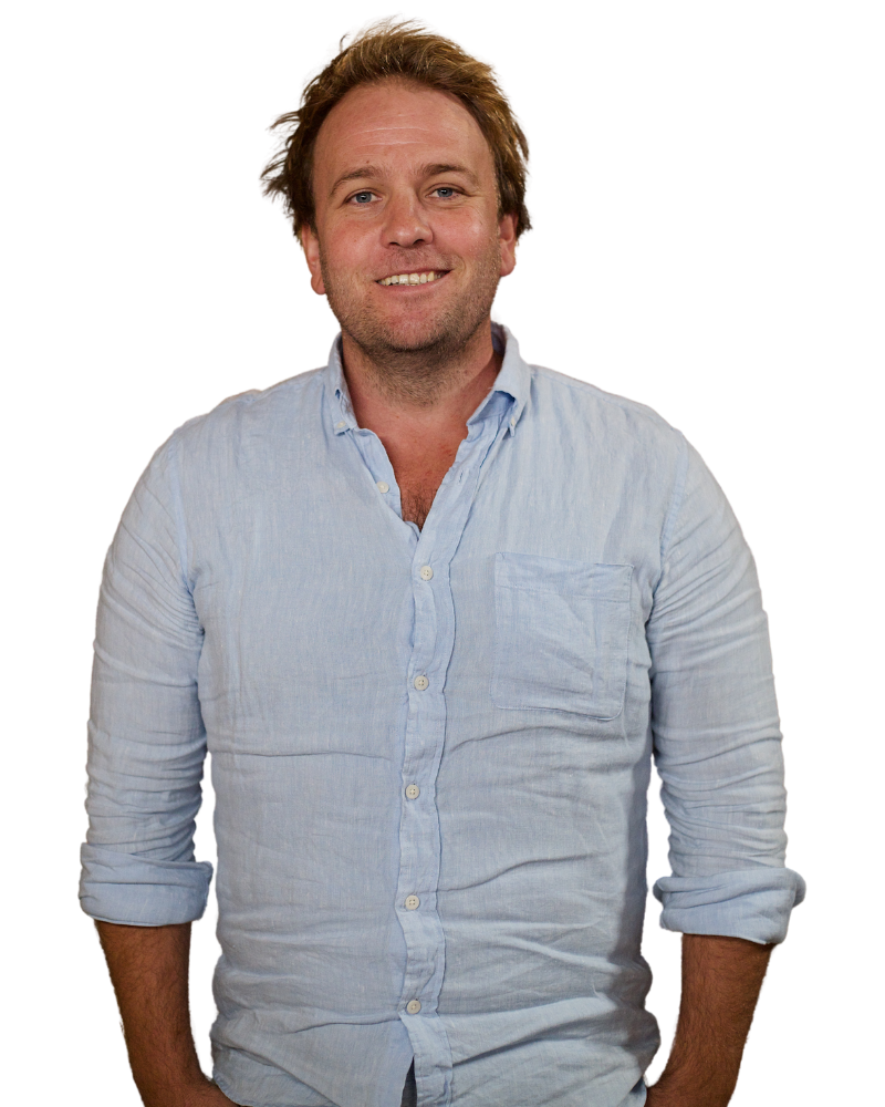 Alexander Grier with light blue shirt smiling