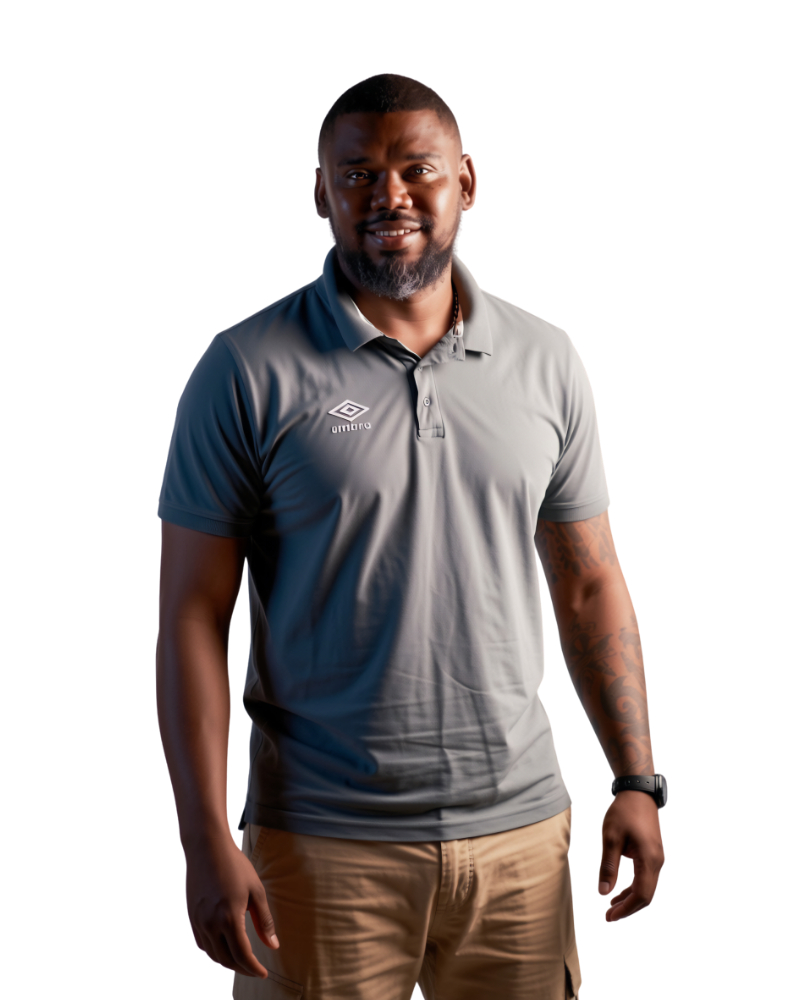 Man in gray Umbro polo and khaki shorts smiling