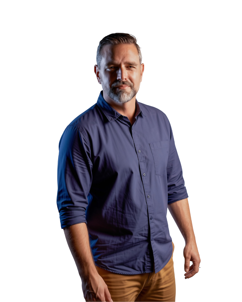 Andri Hanekom om a down shirt and tan pants, looking at camera