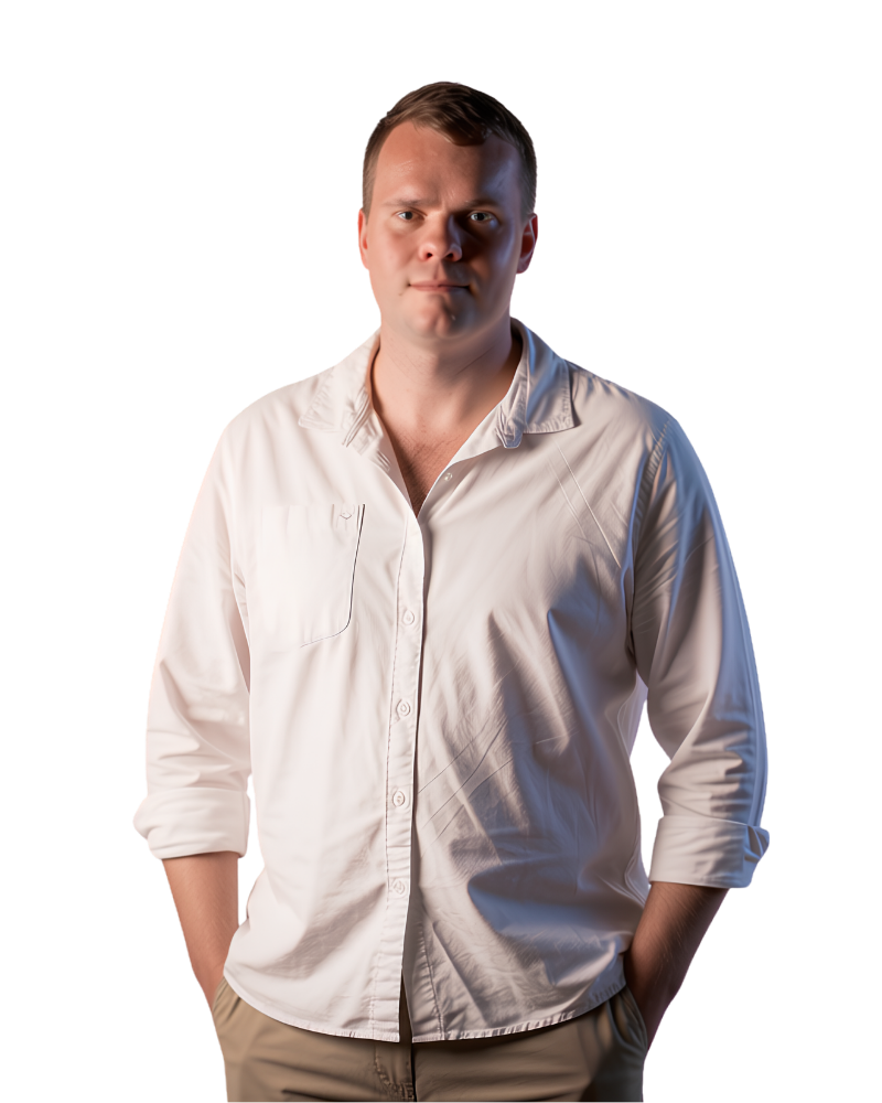 Janco de Kock in a white shirt with hands in pockets, looking at the camera.